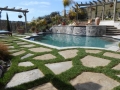 raised-bond-beam-pool-flagstone-and-grass-quality-living-landscape_10009